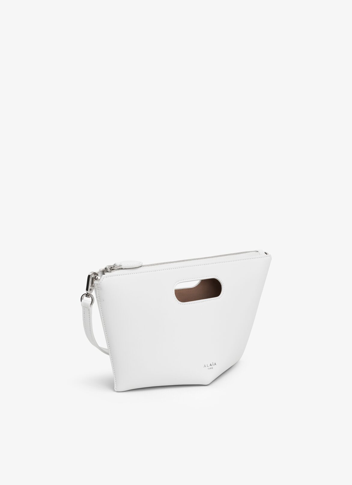 FOLDED ZIPPED BAG IN CALFSKIN ALAÏA OPTIC WHITE FOLDED ZIPPED BAG IN CALFSKIN